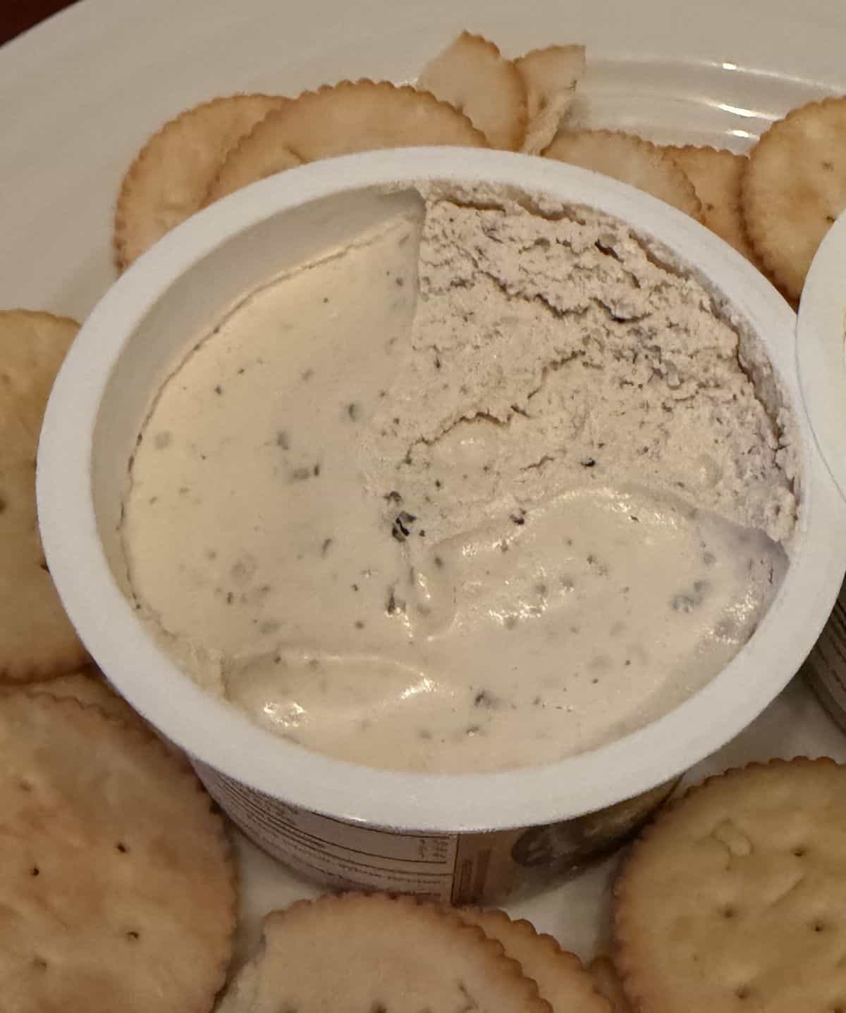 Top down closeup image of the cracked pepper whipped dip opened.