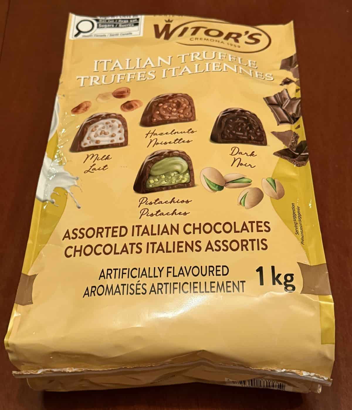 Closeup image of the bag Costco Witor's Italian Truffles laying down on a table unopened.