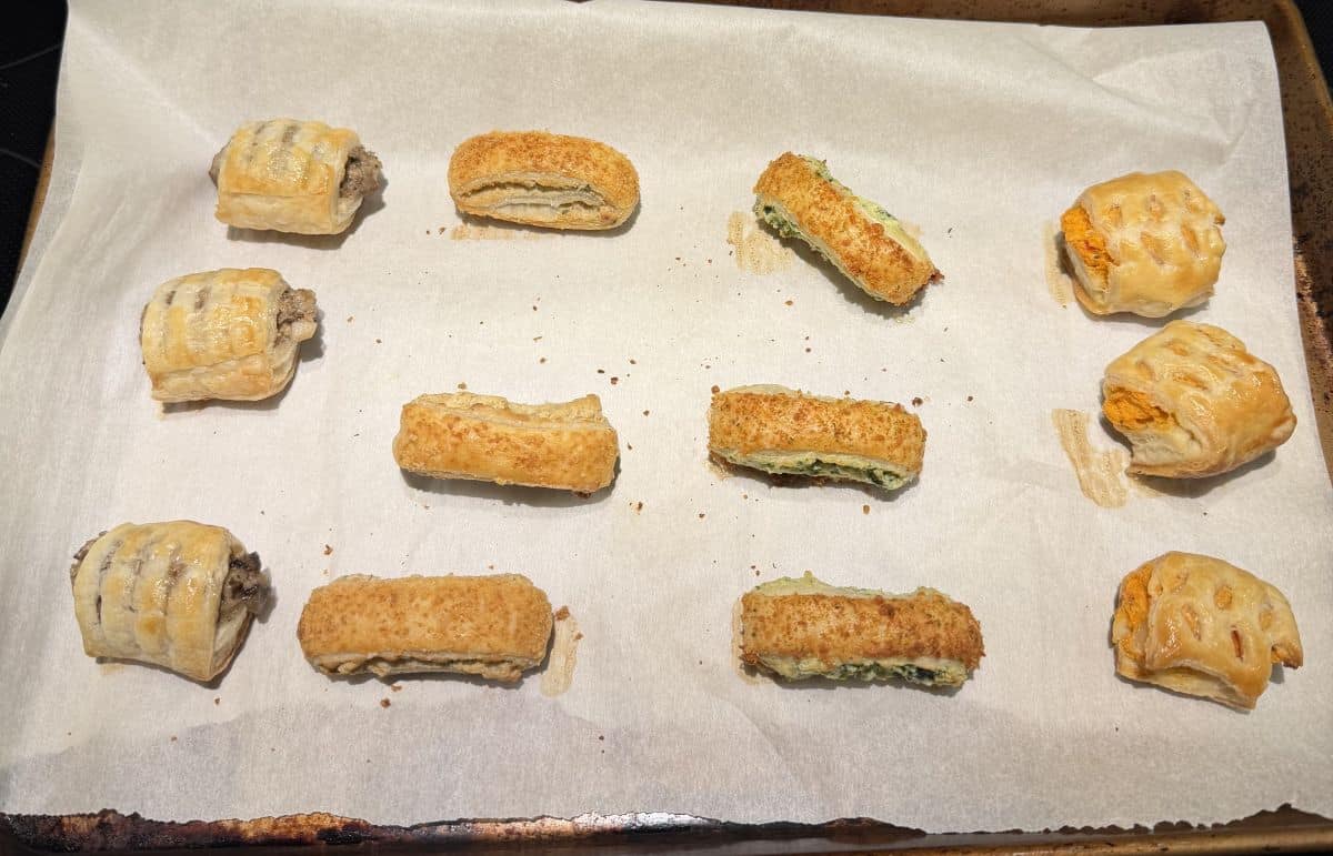Image of the puff pastry on a cookie sheet after being baked in the oven.