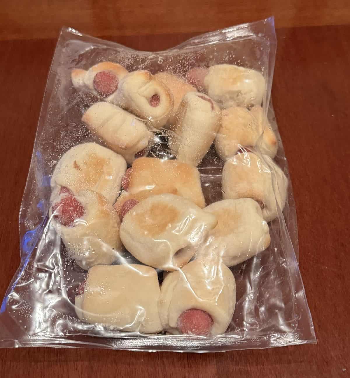 Image of one plastic bag with fifteen mini sausages in the unopened bag.