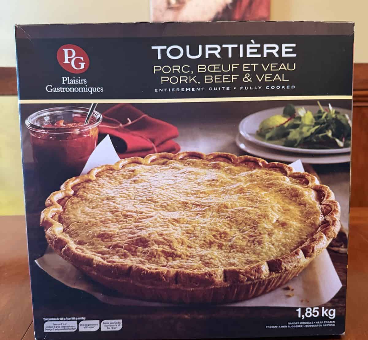 Image of the Costco Plaisirs Gastronomiques Tourtière sitting on a table unopened.