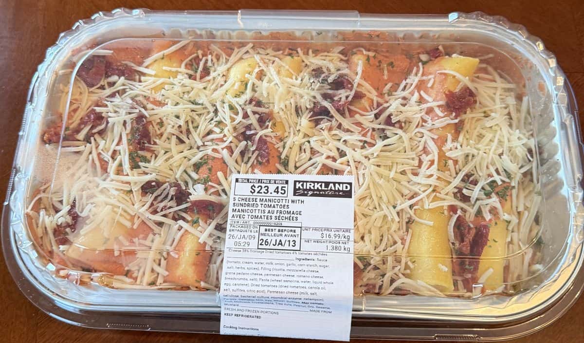 Image of the Costco Kirkland Signature Five Cheese Manicotti with Sundried Tomatoes sitting on a table unopened.