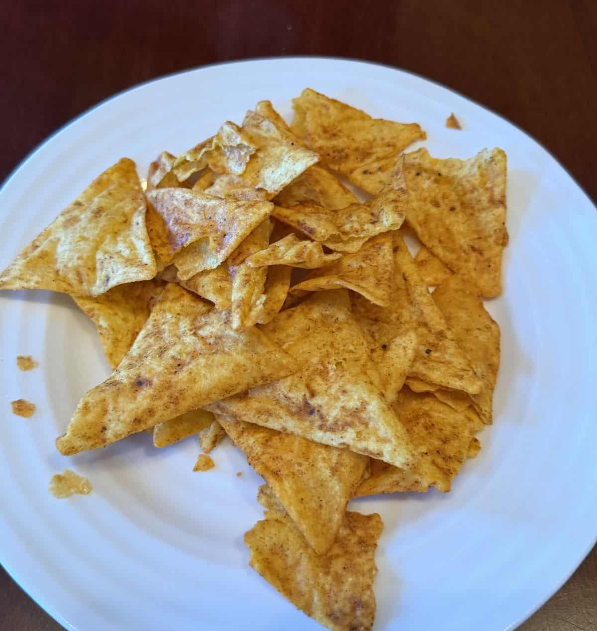Image of the chili lime quest protein chips on a plate.