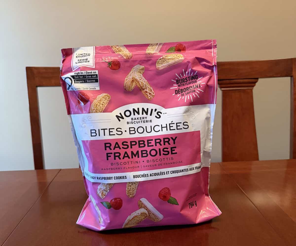 Image of the Costco Nonni's Raspberry Biscotti Bites bag sitting on a table unopened.