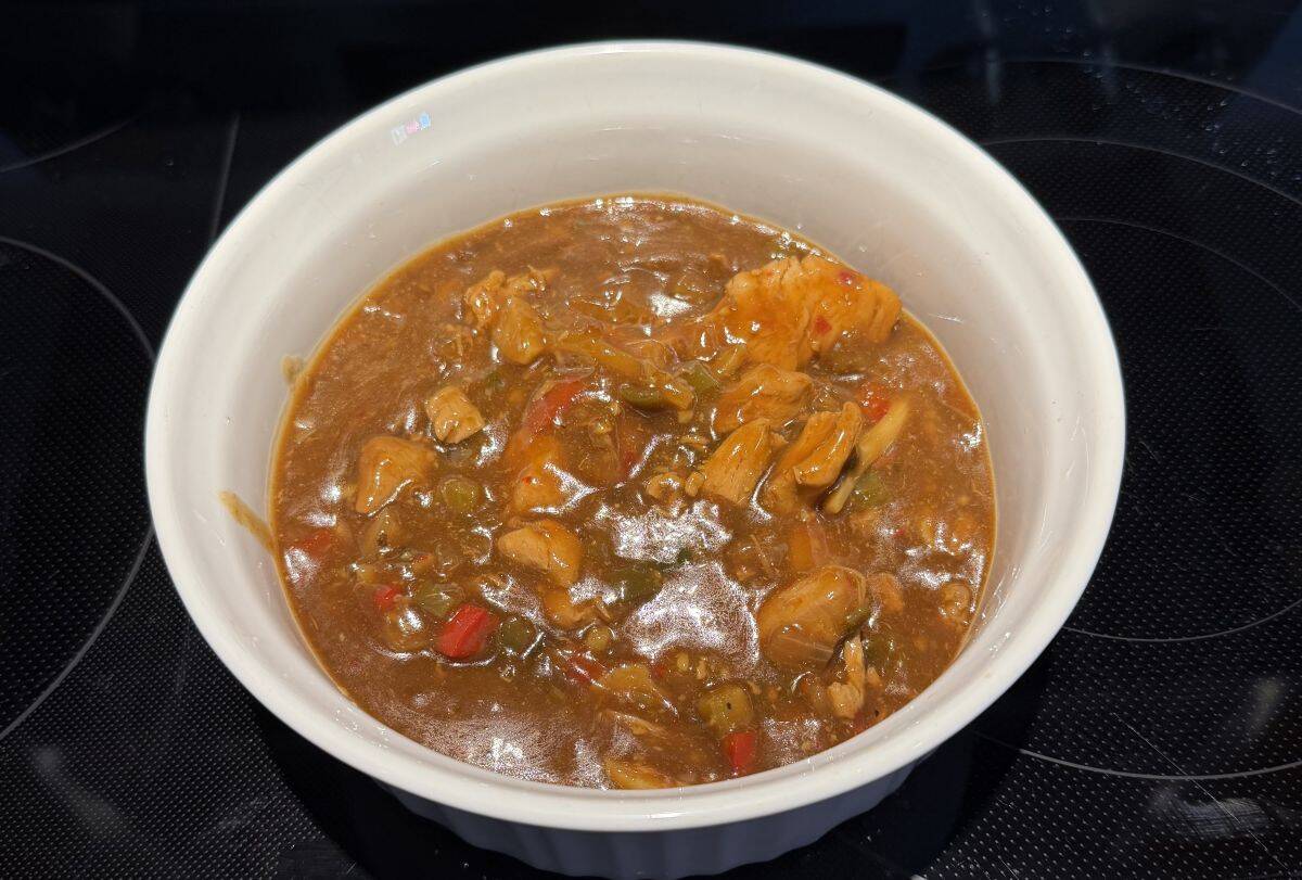 Image of the kung pao chicken in a microwave safe dish after being heated.