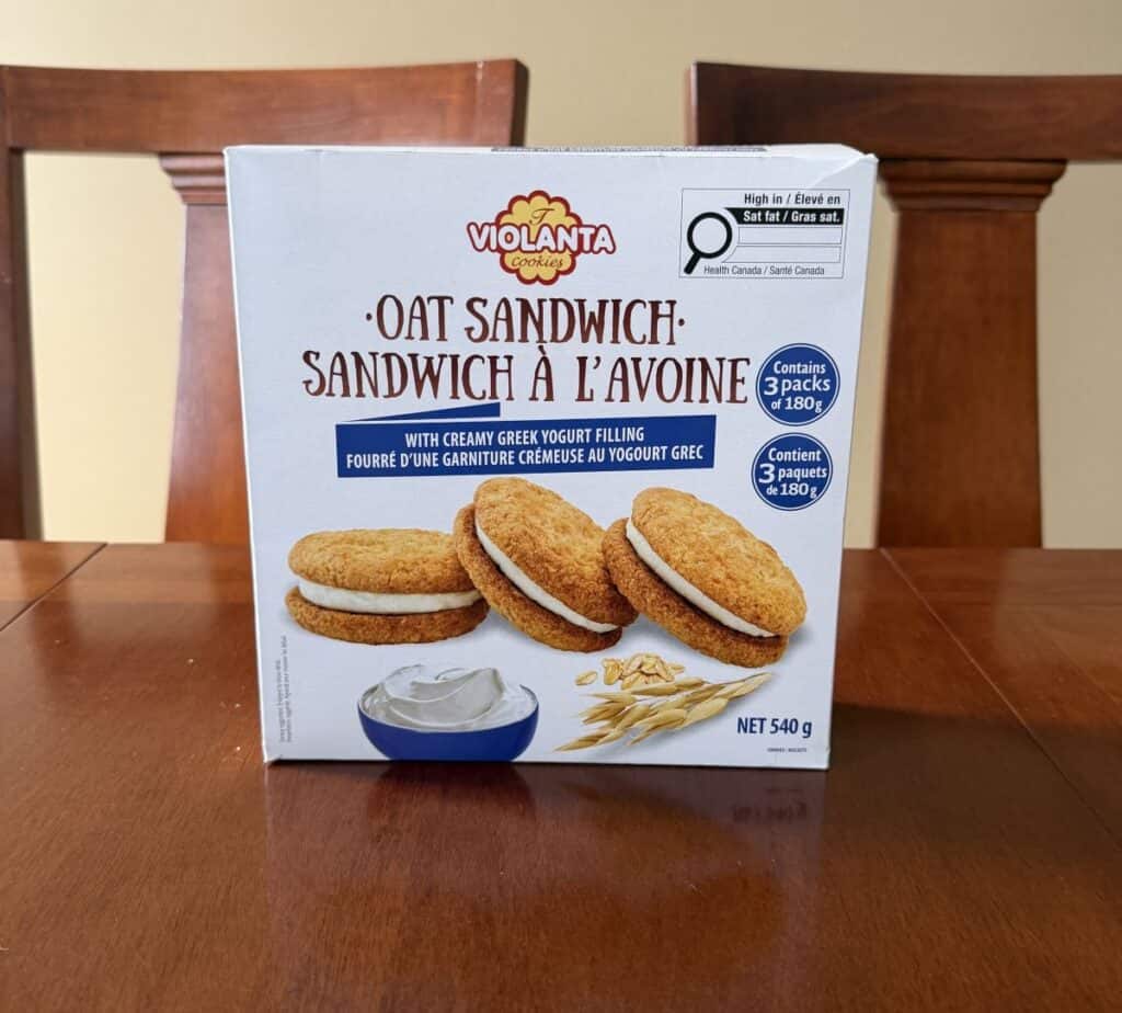 Image of the Costco Violanta Oat Sandwich Cookies Box sitting on a table unopened.