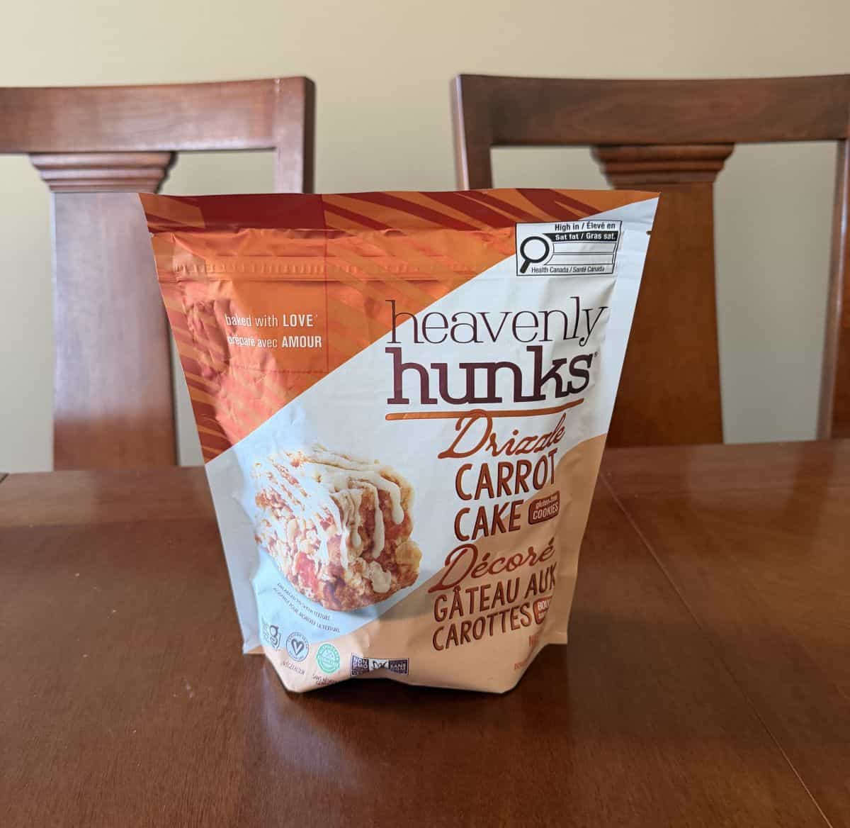 Image of the Costco Drizzle Carrot Cake Heavenly Hunks bag sitting on a table unopened.