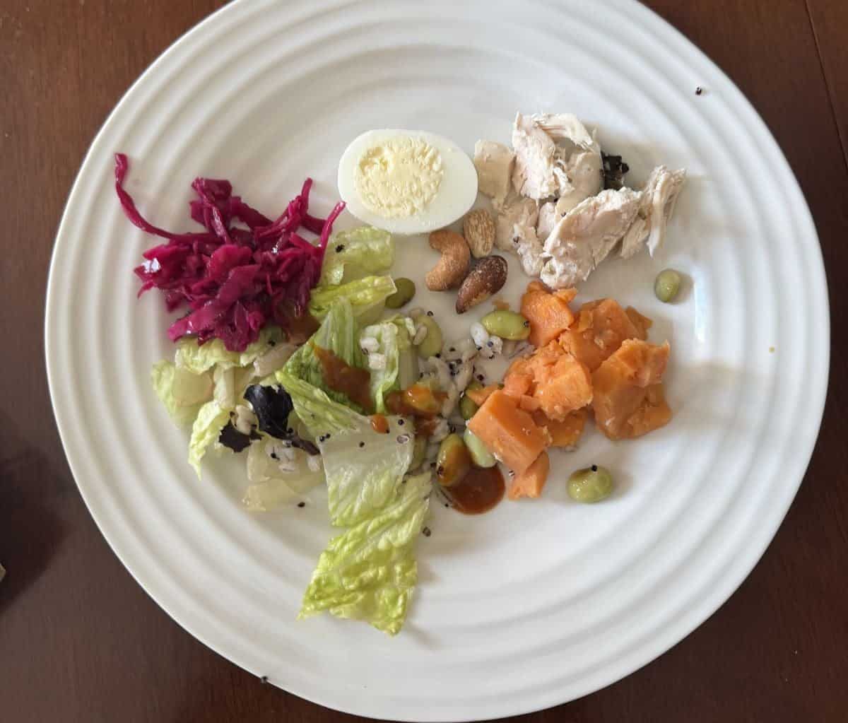Top-down image of the salad served on a white plate.