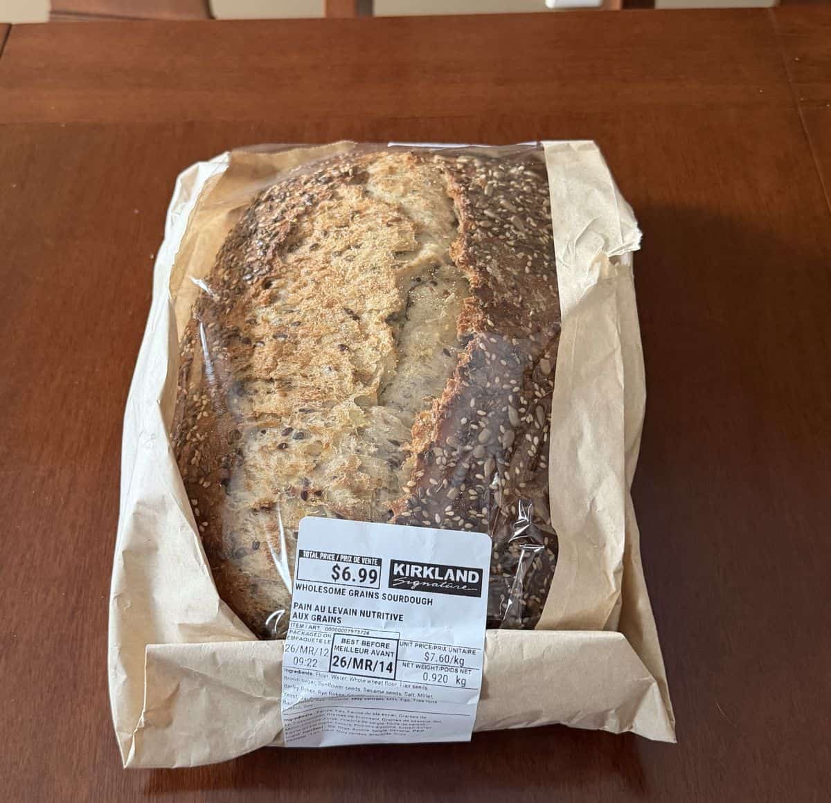 Image of the Kirkland Signature Wholesome Grains Sourdough sitting on a table unopened.