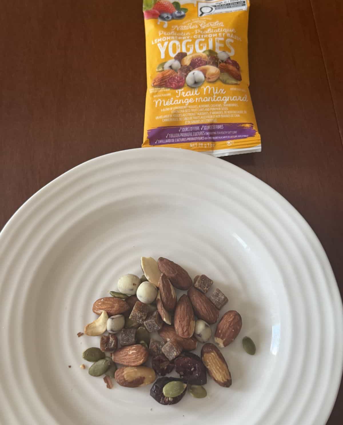 Top down image of the lemon berry trail mix served on a white plate.
