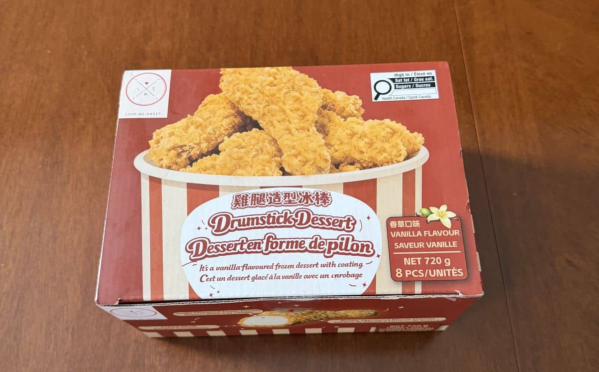 Image of the Love Me Sweet Drumstick Dessert box sitting on a table unopened.