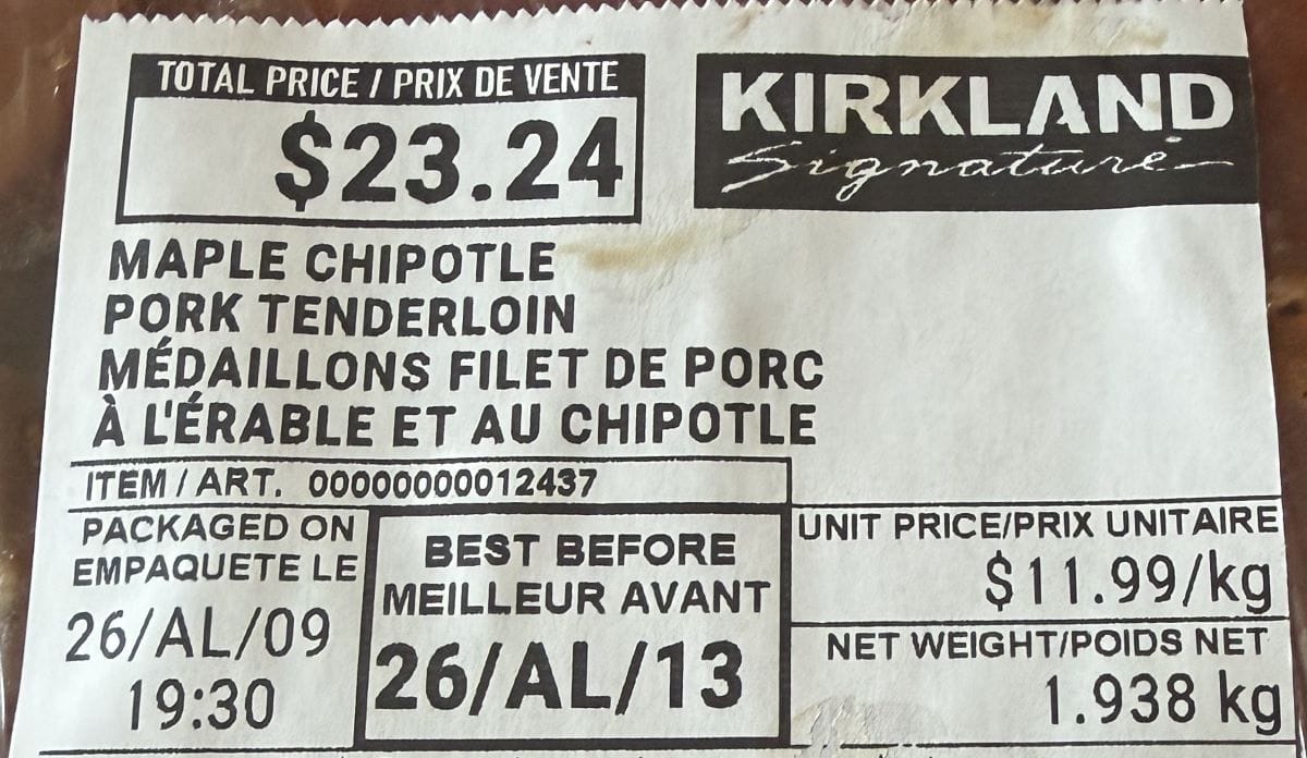 Closeup image of the pork tenderloin front label showing the cost and best before date.