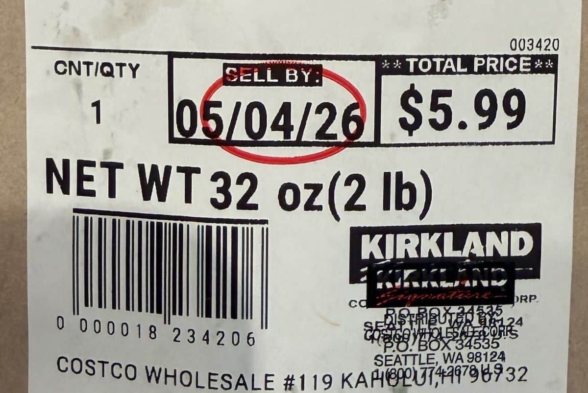 Closeup image of the front label on the Kirkland Signature Italian Rustic Loaf showing price and best before date.