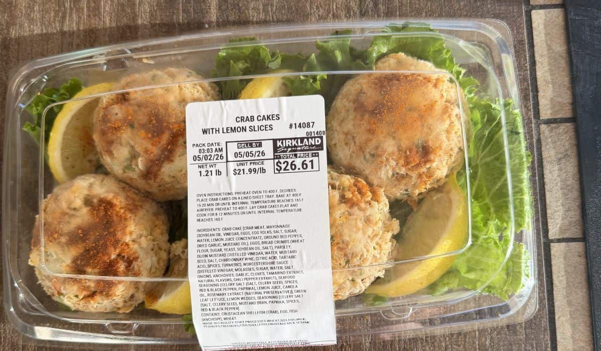 Top down image of the Costco Kirkland Signature Crab Cakes container sitting on a table unopened.