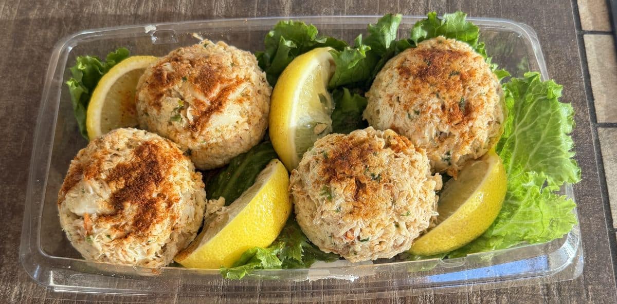 Top down image of an open container of the crab cakes from Costco showing the contents of the package.