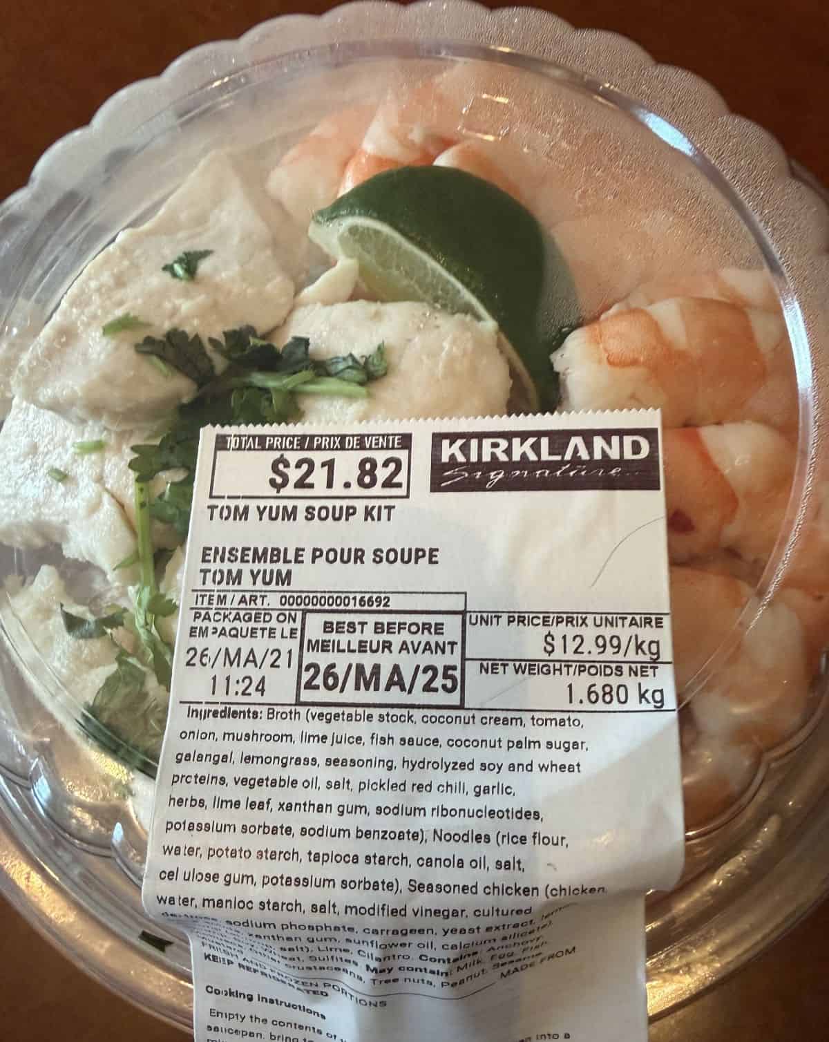 Closeup image of the front label on the Tom Yum Soup Kit showing cost and best before date.