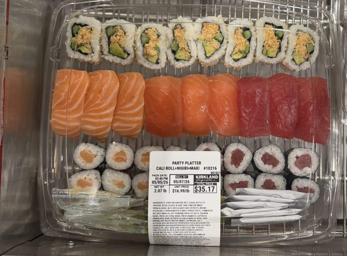 Image of the Costco Kirkland Signature Party Platter with California Roll, Nigiri and Maki tray unopened.