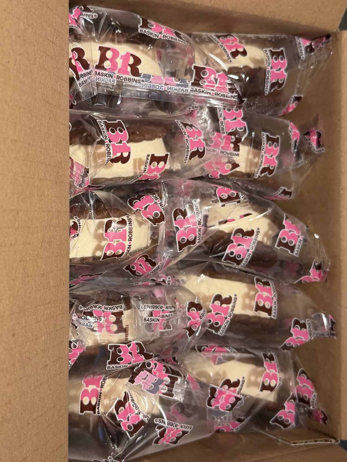 Image of an open box of the ice cream sandwiches showing the all individually packaged in the box.