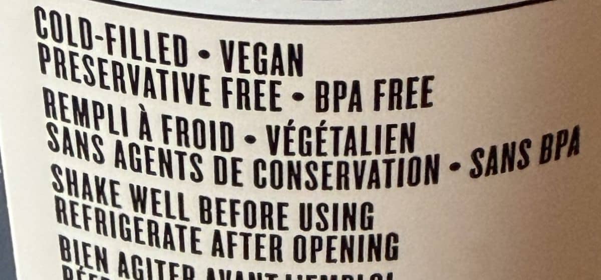 Image of the back of the bottle showing the barbecue sauce is cold-filled, vegan.