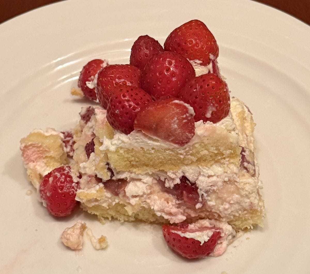 Image of one slice of cake served on a white plate.