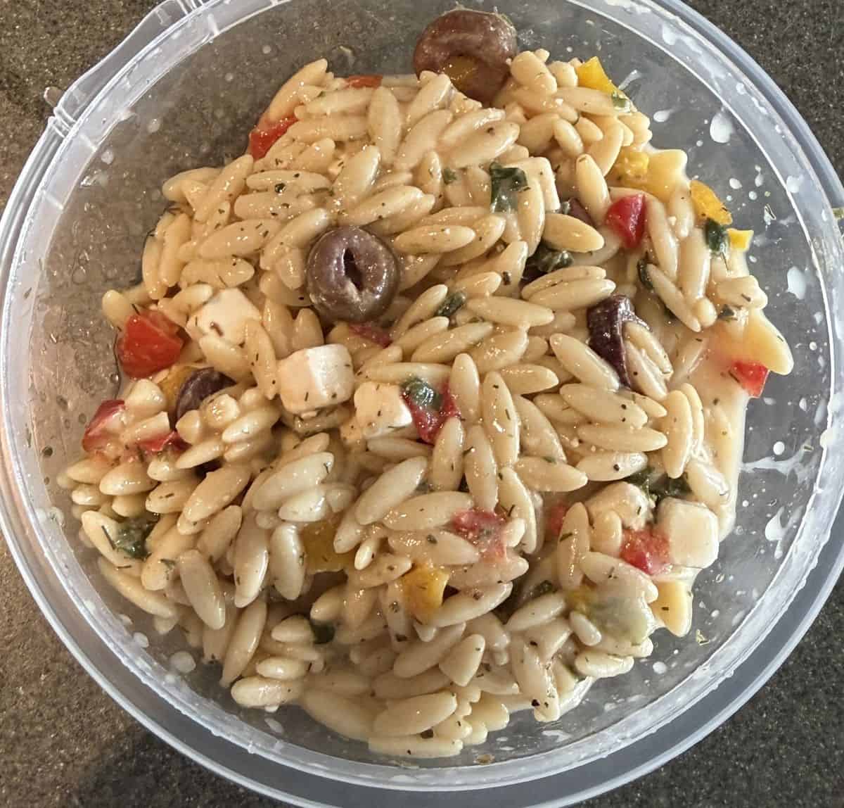 Top down image closeup image of the orzo salad so you can see the salad.