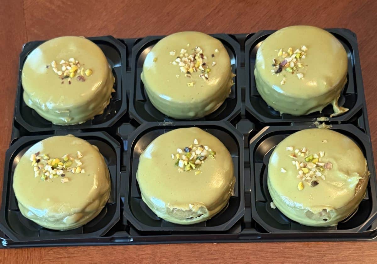 Image of the open package of the pistachio chocolate mousse desserts showing what the desserts clearly look like.