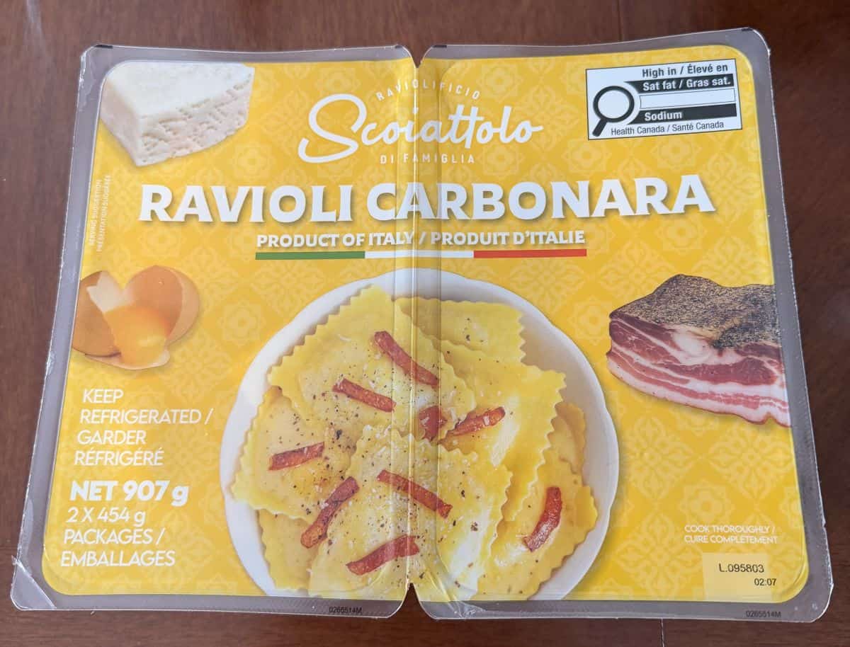 Image of the Costco Scoiattolo Ravioli Carbonara package sitting on a table unopened.