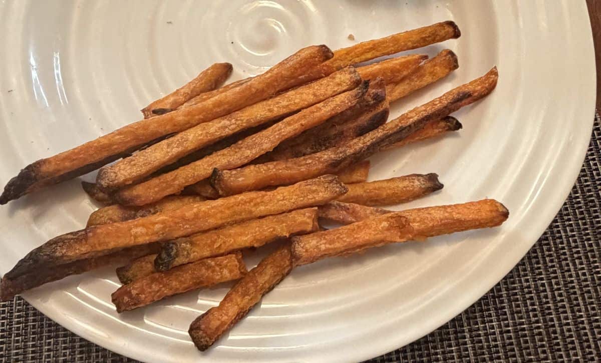 Image of the sweet potato fries served on a white plate.