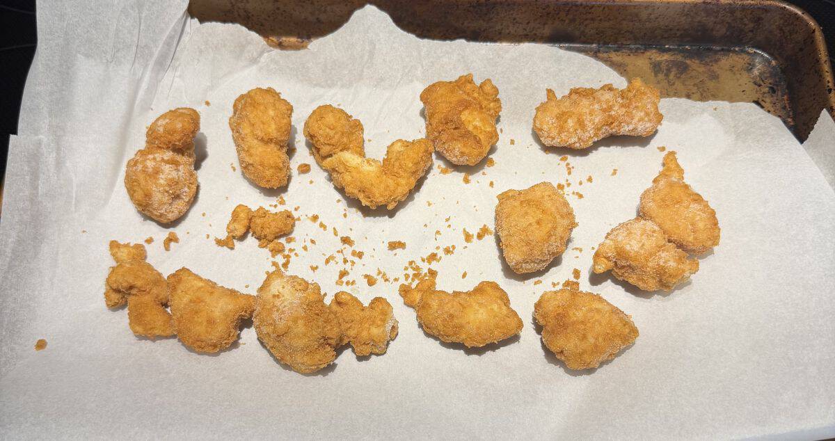 Image of the lemon chicken before being cooked on a baking tray.