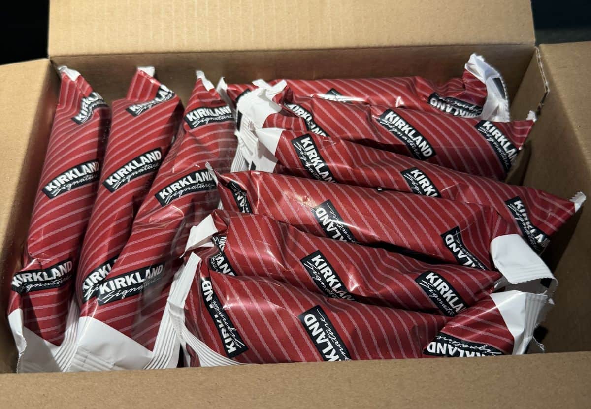 Top down image of an open box of the ice cream bars showing all the individually wrapped bars in the box.