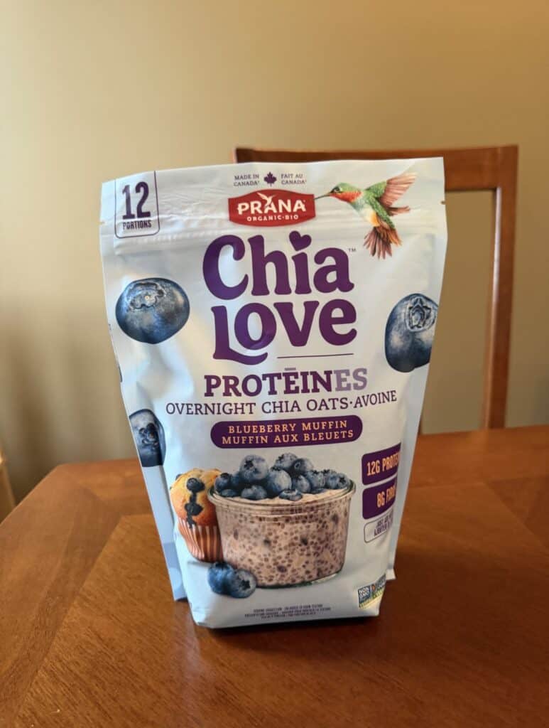 Image of the Costco Prana Chia Love Protein Overnight Oats bag sitting on a table unopened.