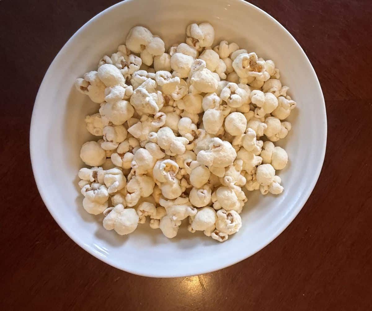 Top down image of one bowl of protein popcorn.
