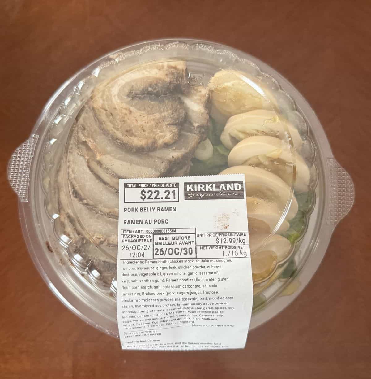 Top down image of the Costco Kirkland Signature Pork Belly Ramen container unopened sitting on a table.